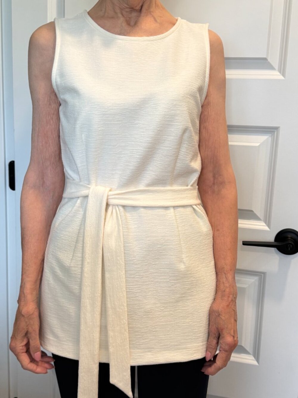 Ann Taylor - Factory, 28.5" long belted silhouette sleeveless top in size S.
